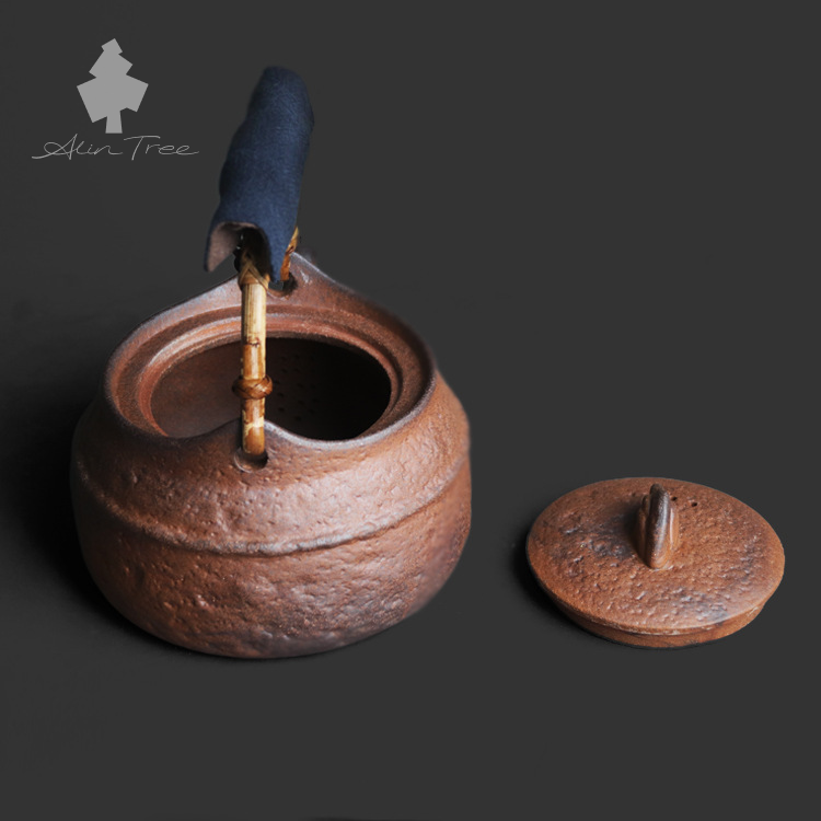 Coarse Stoneware Old Rock Clay Teapot with a Rattan-Wrapped Handle