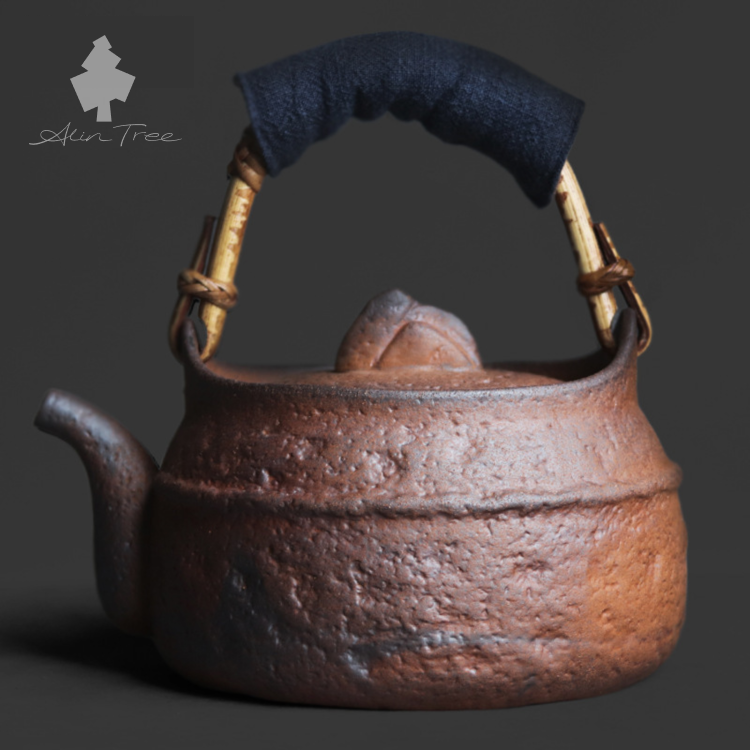 Coarse Stoneware Old Rock Clay Teapot with a Rattan-Wrapped Handle