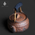 Coarse Stoneware Old Rock Clay Teapot with a Rattan-Wrapped Handle
